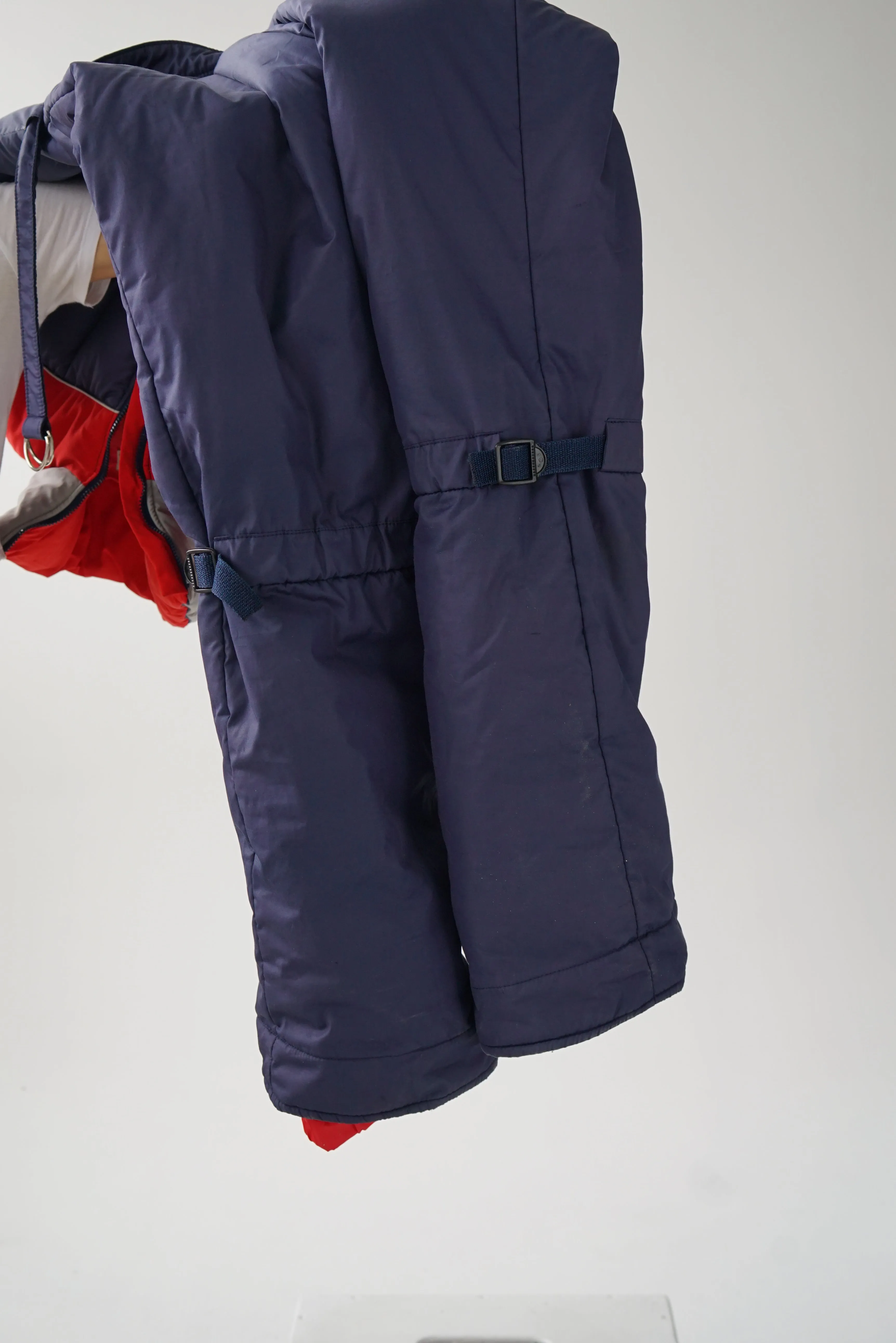 One piece vintage Ditrani ski suit, snow suit en duvet rouge et bleu pour homme taille 42 (M)