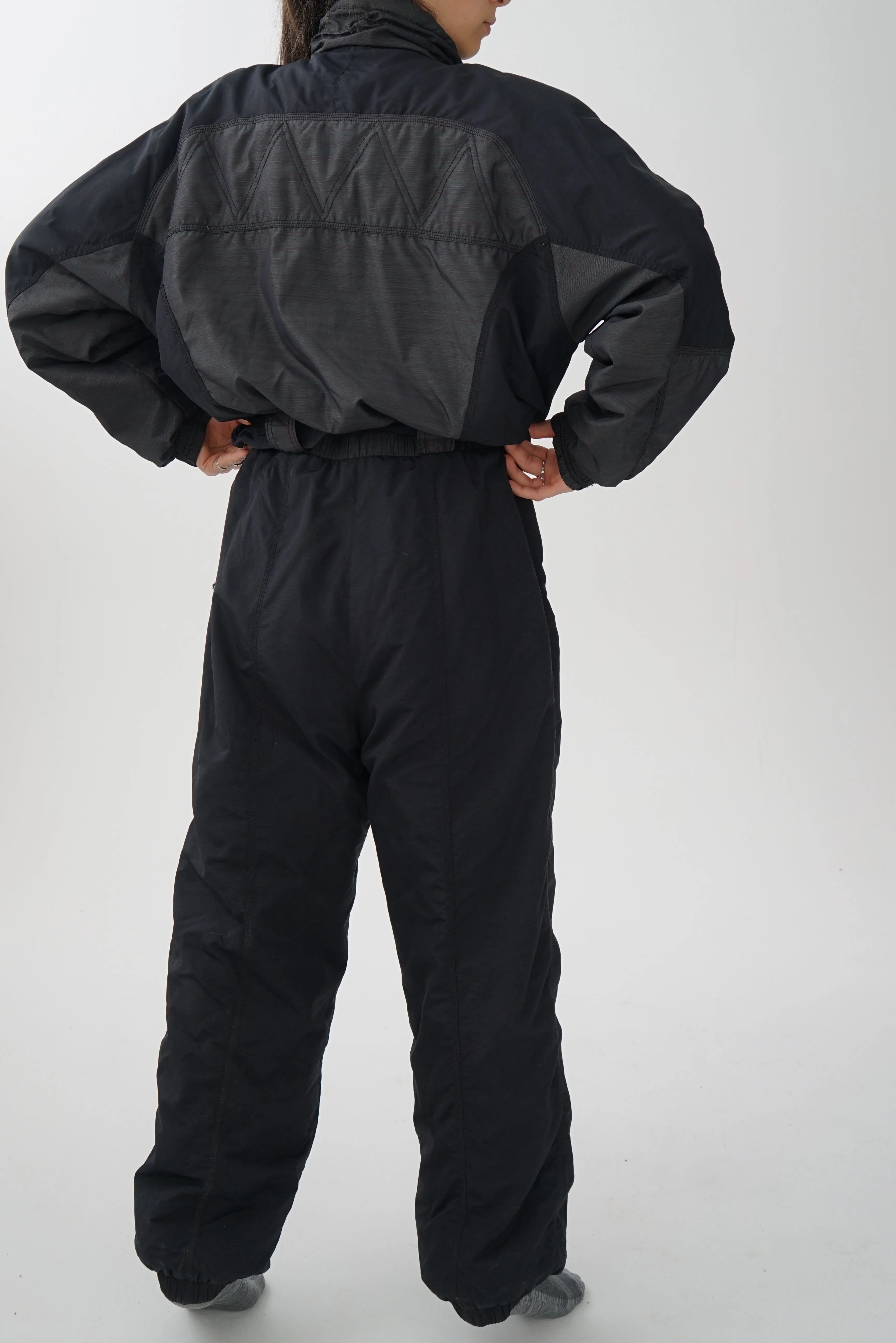 One piece vintage Etirel ski suit, snow suit noir avec métallique unisex taille XXL